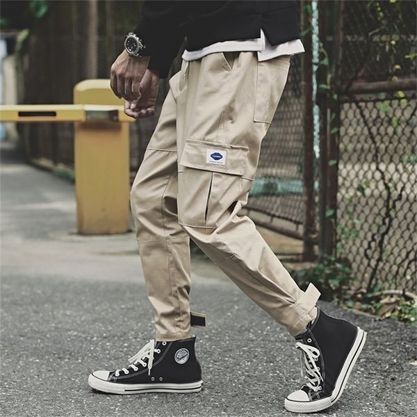 men's side pockets cargo harem pants fashion ribbons black hip hop casual male joggers trousers fashion streetwear pants lj201222
men's side pockets cargo harem pants fashion ribbons black hip hop casual male joggers trousers fashion streetwear pants lj201222