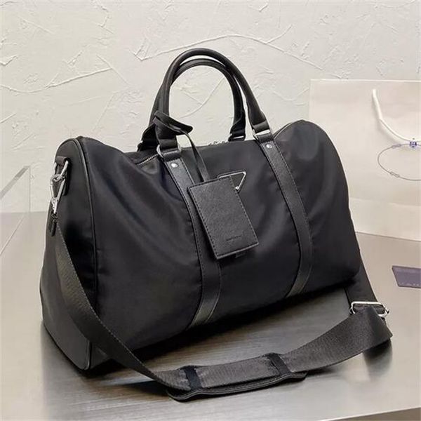 fashion luxurys black nylon duffle bag 43cm designers luggage bags men women shoulder travel sports bag large capacity waterproof duffel bag
fashion luxurys black nylon duffle bag 43cm designers luggage bags men women shoulder travel sports bag large capacity waterproof duffel bag