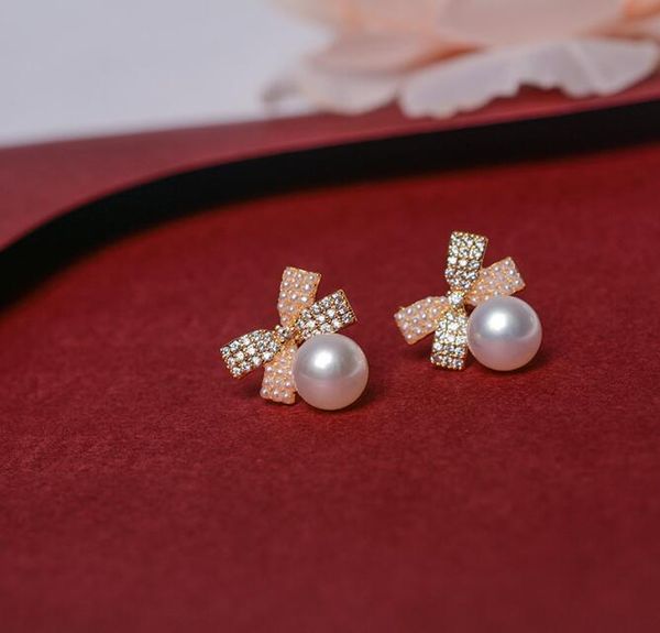 14k gold plating zircon bow ear studs natural freshwater pearl earrings white lady/girl fashion wedding jewelry, Golden;silver
14k gold plating zircon bow ear studs natural freshwater pearl earrings white lady/girl fashion wedding jewelry, Golden;silver