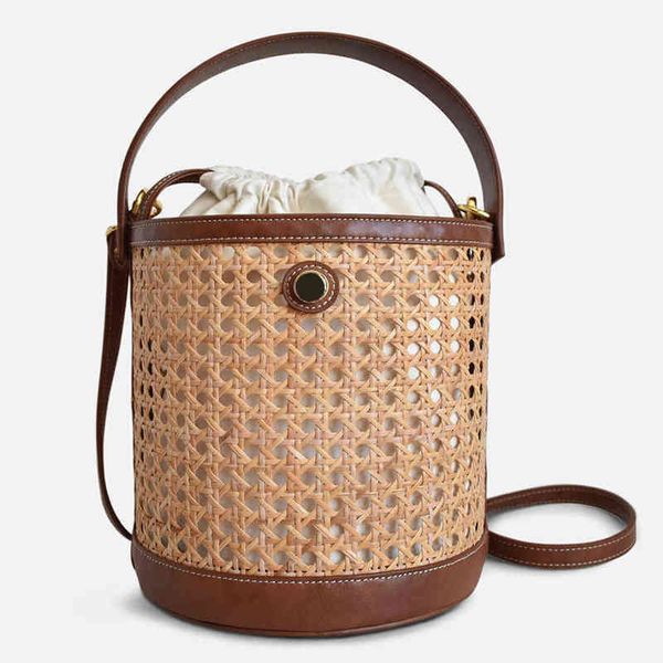 designer brands hollow rattan bucket bag wicker woven women handbag luxury pu patchwork shoulder crossbody s summer beach 220427
designer brands hollow rattan bucket bag wicker woven women handbag luxury pu patchwork shoulder crossbody s summer beach 220427
