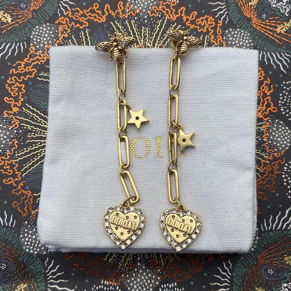 factory retail and wholesale dijia new heart-shaped diamond studded star earrings female d-house temperament bee tassel, Golden
factory retail and wholesale dijia new heart-shaped diamond studded star earrings female d-house temperament bee tassel, Golden