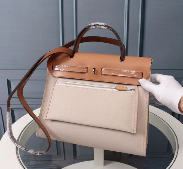 classic new female shoulder luxury canvas campus style portable fashion leather women bag, Red;black
classic new female shoulder luxury canvas campus style portable fashion leather women bag, Red;black