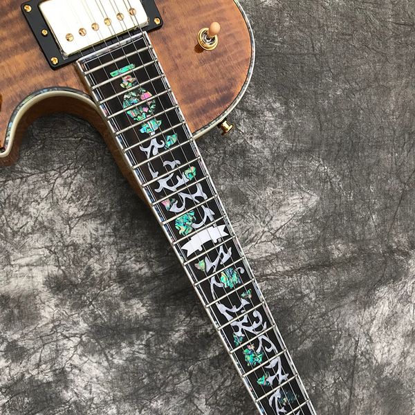 chinese electric guitar cusotm transparent bown color flowers inlays gold hardware les
chinese electric guitar cusotm transparent bown color flowers inlays gold hardware les