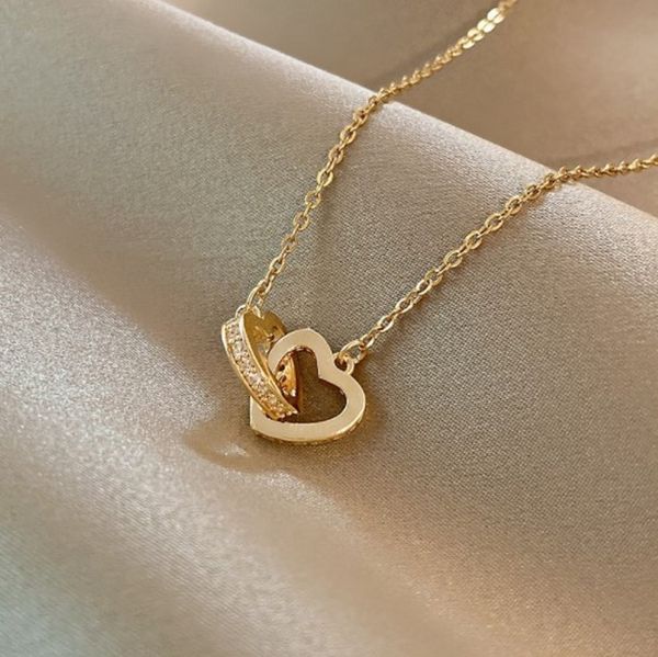the designer created a titanium steel necklace with a double heart for women's fashion jewelry, Silver
the designer created a titanium steel necklace with a double heart for women's fashion jewelry, Silver