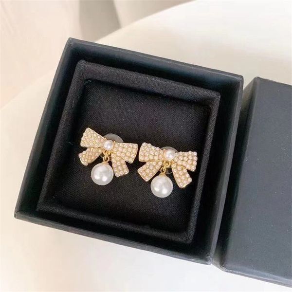 pearls earrings designer luxury ladies gilded diamonds 925 silver needle bowknot earring with gift box x0907c, Golden;silver
pearls earrings designer luxury ladies gilded diamonds 925 silver needle bowknot earring with gift box x0907c, Golden;silver