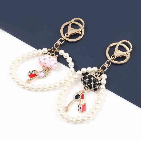fashion simple metal imitation pearl handbag fairy lipstick keychain car key ring girl backpack pendant campus jewelry aa220318, Silver
fashion simple metal imitation pearl handbag fairy lipstick keychain car key ring girl backpack pendant campus jewelry aa220318, Silver