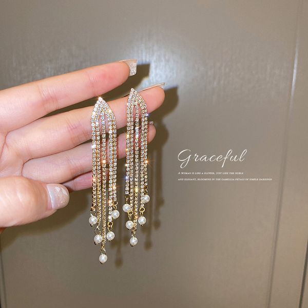 925 silver needle pearl rhinestone tassel earrings long european and american high-key eardrop internet new fairy temperamental earrings, Golden
925 silver needle pearl rhinestone tassel earrings long european and american high-key eardrop internet new fairy temperamental earrings, Golden