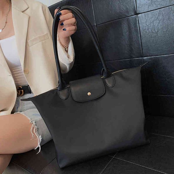 large capacity oxford cloth shoulder beach tote bag designer nylon purses and handbags luxury big size shopping bag
large capacity oxford cloth shoulder beach tote bag designer nylon purses and handbags luxury big size shopping bag