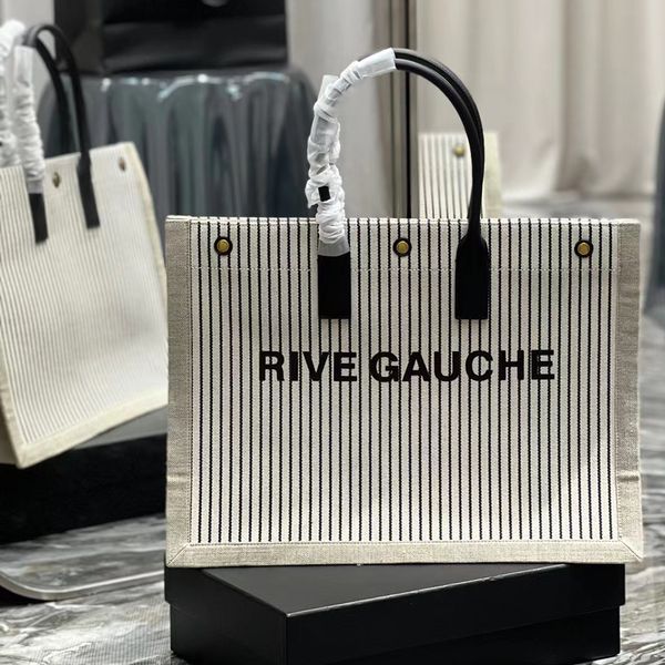 rive gauche tote bag in striped canvas and smooth leather bucket large beach handbags women shopping purse ladies luxurys designers quality
rive gauche tote bag in striped canvas and smooth leather bucket large beach handbags women shopping purse ladies luxurys designers quality