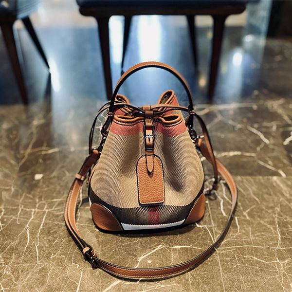 luxury women's bag plaid canvas leather bucket bag with tag new classic designer drawstring female shoulder handbag
luxury women's bag plaid canvas leather bucket bag with tag new classic designer drawstring female shoulder handbag