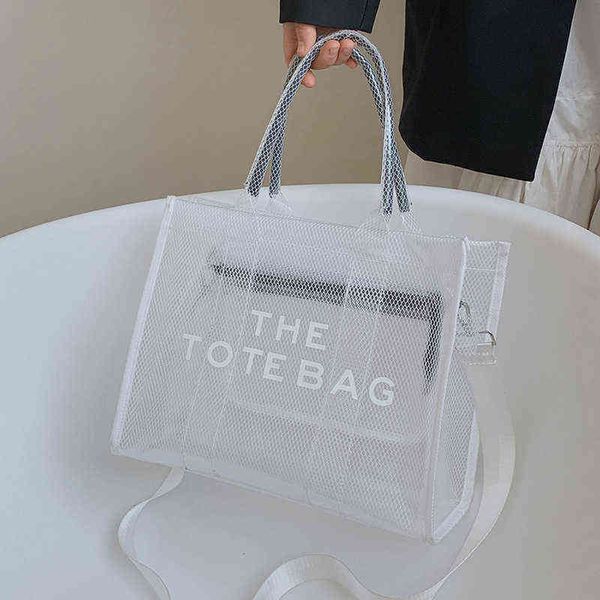 the tote bag women handbag candy color transparent jelly shopping bag pvc mesh beach handbag 220617
the tote bag women handbag candy color transparent jelly shopping bag pvc mesh beach handbag 220617