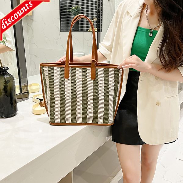 factory online export designer brand bag handbag striped tote 2022 new versatile and mother's set feeling female underarm shoulder
factory online export designer brand bag handbag striped tote 2022 new versatile and mother's set feeling female underarm shoulder