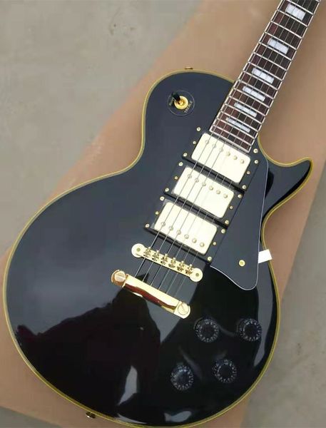 gold hardware rosewood fretboard 6 string electric guitar with 3 black pickups
gold hardware rosewood fretboard 6 string electric guitar with 3 black pickups
