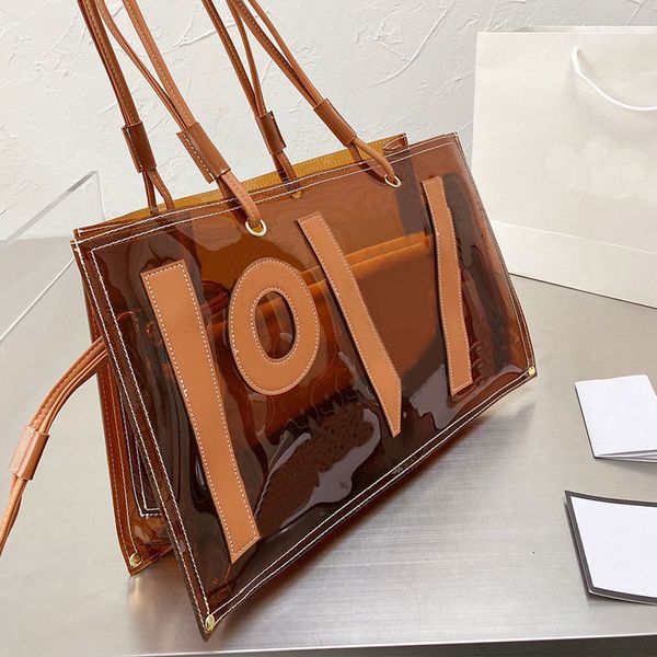 jelly transparent tote shopping bag women pvc handbags leather letters shoulder bags brand handbag large capacity pocket two piece set
jelly transparent tote shopping bag women pvc handbags leather letters shoulder bags brand handbag large capacity pocket two piece set