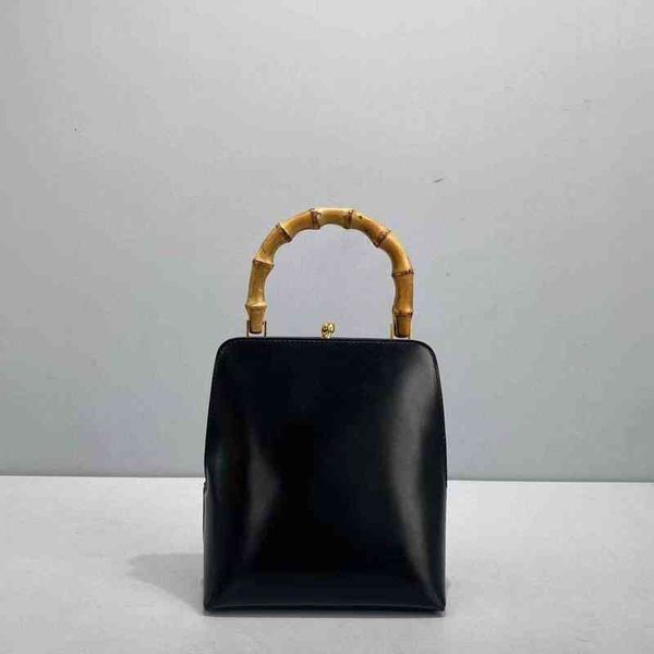 jil portable bamboo handle bag 21 summer and autumn cowhide women's medlar mouth gold square hand
jil portable bamboo handle bag 21 summer and autumn cowhide women's medlar mouth gold square hand