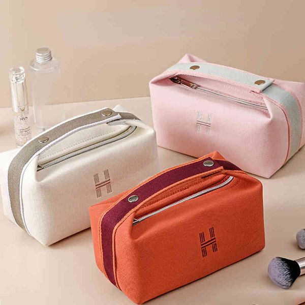 portable canvas cosmetic bag women's summer new outdoor portable storage bag waterproof and dustproof washing bag 220625
portable canvas cosmetic bag women's summer new outdoor portable storage bag waterproof and dustproof washing bag 220625