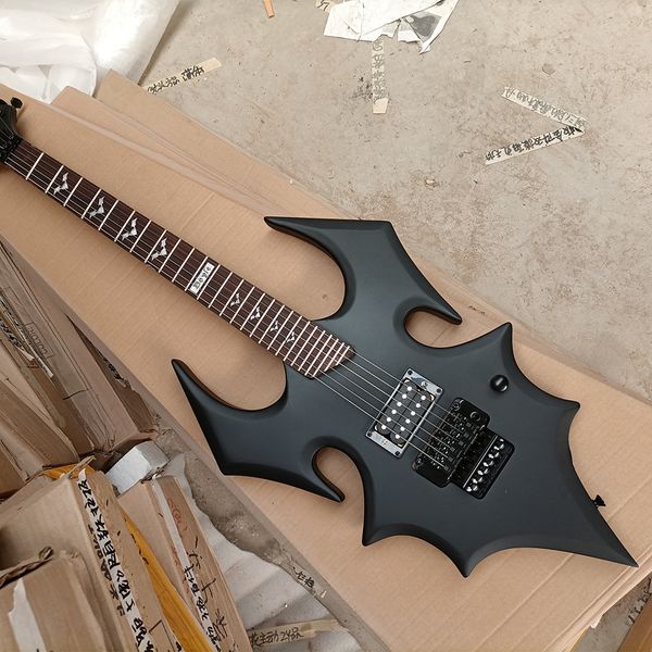 6 strings matte black unusual shaped electric guitar with rosewood fretboard
6 strings matte black unusual shaped electric guitar with rosewood fretboard