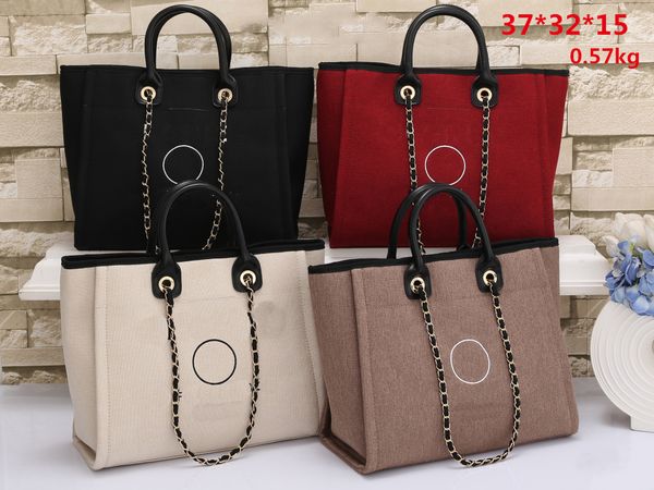 22ss new summer beach party shopping bag doville chain handle handbag silver hardware large capacity luxury designer handbags sacoche luxury
22ss new summer beach party shopping bag doville chain handle handbag silver hardware large capacity luxury designer handbags sacoche luxury
