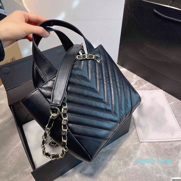 cc bag designer- fashion ladies mini bags genuine leather bags gold-tone metal chain stripes totes handbags crossbody shoulder bag 20*19cm
cc bag designer- fashion ladies mini bags genuine leather bags gold-tone metal chain stripes totes handbags crossbody shoulder bag 20*19cm