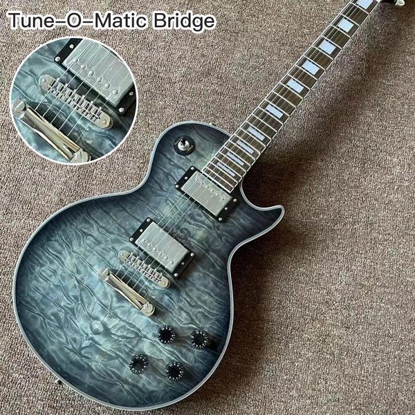 custom electric guitar,tune-o-matic bridge,tiger flame maple 6 stings guitarra,rosewood fingerboard mahogany body
custom electric guitar,tune-o-matic bridge,tiger flame maple 6 stings guitarra,rosewood fingerboard mahogany body