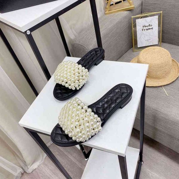 sandals in women's beaded flat sandals casual shoes black and white personalized design fashion
sandals in women's beaded flat sandals casual shoes black and white personalized design fashion