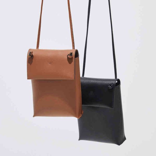 korean minority decke mobile phone bag women's messenger bag plain leather headset bag mini purse 220617
korean minority decke mobile phone bag women's messenger bag plain leather headset bag mini purse 220617