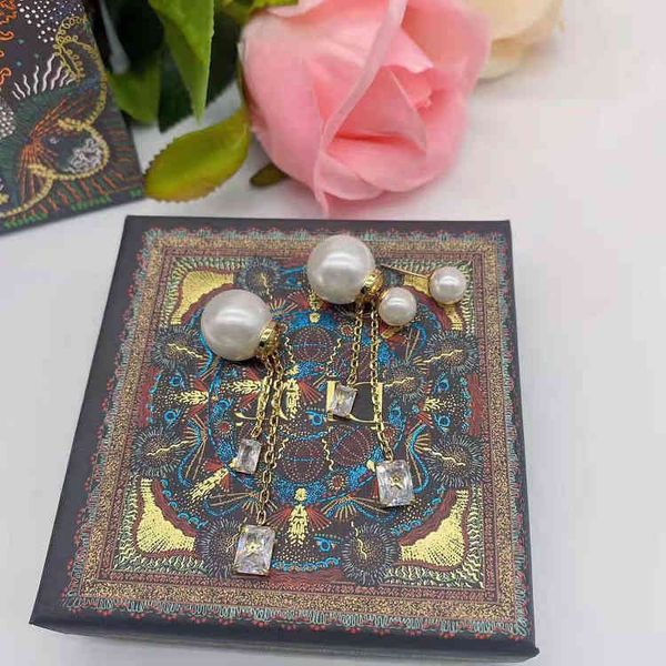 jewelry 2022 letter inlaid with rectangular stone size pearl tassel brass material minority design earrings, Golden
jewelry 2022 letter inlaid with rectangular stone size pearl tassel brass material minority design earrings, Golden