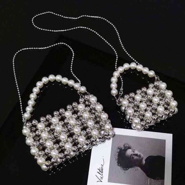 silver pearl bag niche design beaded bag retro single shoulder diagonal hand-woven bag x220331
silver pearl bag niche design beaded bag retro single shoulder diagonal hand-woven bag x220331
