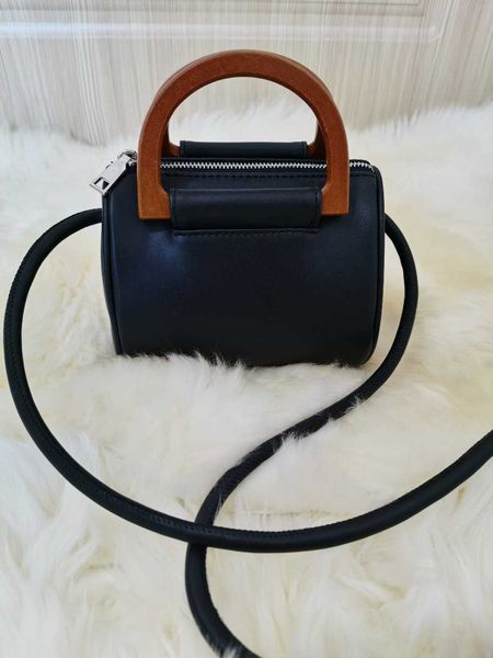 store new mini bag personalized creative messenger minority design girl's barrel wooden wrist shoulder bag
store new mini bag personalized creative messenger minority design girl's barrel wooden wrist shoulder bag