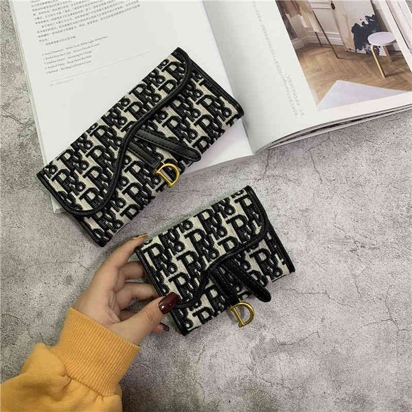 small wallet women's short alphabet printing folding wallet canvas multi card slot long handbag, Brown;gray
small wallet women's short alphabet printing folding wallet canvas multi card slot long handbag, Brown;gray