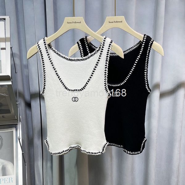 women's knits & tees early spring design sense black and white contrast embroidery hem split inside with suspender knitted vest for wom
women's knits & tees early spring design sense black and white contrast embroidery hem split inside with suspender knitted vest for wom