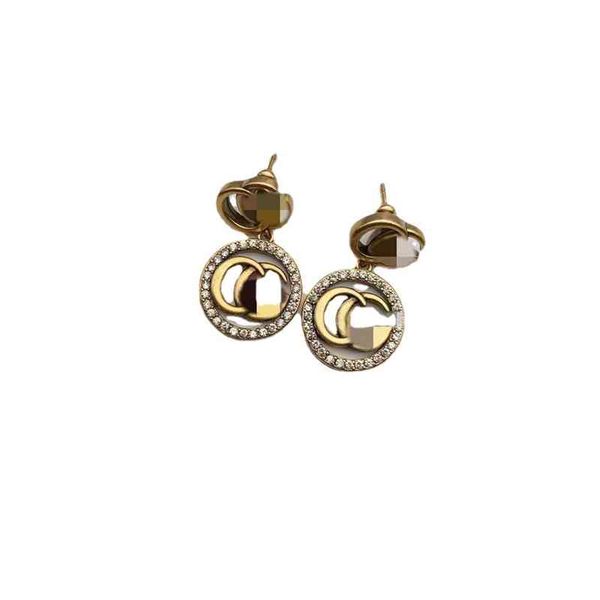 88% off wholesale store family gujia new classic ring hollowed out diamond inlaid double 925 silver needle earrings, Golden
88% off wholesale store family gujia new classic ring hollowed out diamond inlaid double 925 silver needle earrings, Golden