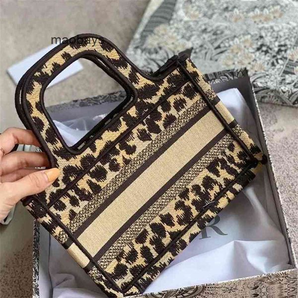 christian handbags designers luxury women handbags d female mini tote embroidered leopard print tote portable shopping bag
christian handbags designers luxury women handbags d female mini tote embroidered leopard print tote portable shopping bag