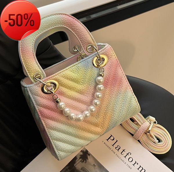 the factory directly minority dign female summer 2022 new fashion pearl portable single shoulder msenger women's diana bag 
the factory directly minority dign female summer 2022 new fashion pearl portable single shoulder msenger women's diana bag