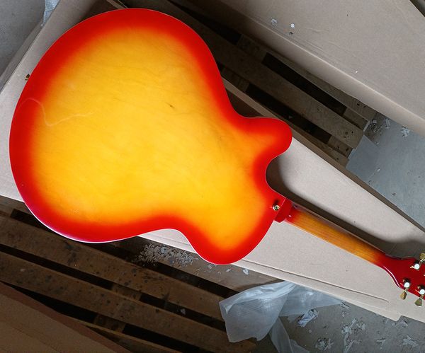 6 string cherry sunburst semi-hollow electric guitar with rosewood fretboard 
6 string cherry sunburst semi-hollow electric guitar with rosewood fretboard