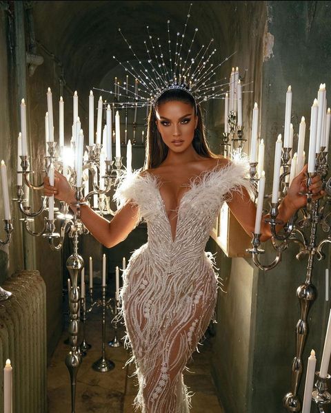 2022 bridal gowns wedding dresses luxury floral pearls mermaid deep v-neck sweep train beads feather appliqued chic custom made, White
2022 bridal gowns wedding dresses luxury floral pearls mermaid deep v-neck sweep train beads feather appliqued chic custom made, White