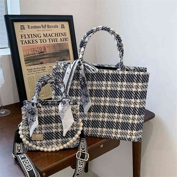 summer version simple foreign style plaid canvas bag fashion pearl chain portable tote bag 75% purses stores sale
summer version simple foreign style plaid canvas bag fashion pearl chain portable tote bag 75% purses stores sale