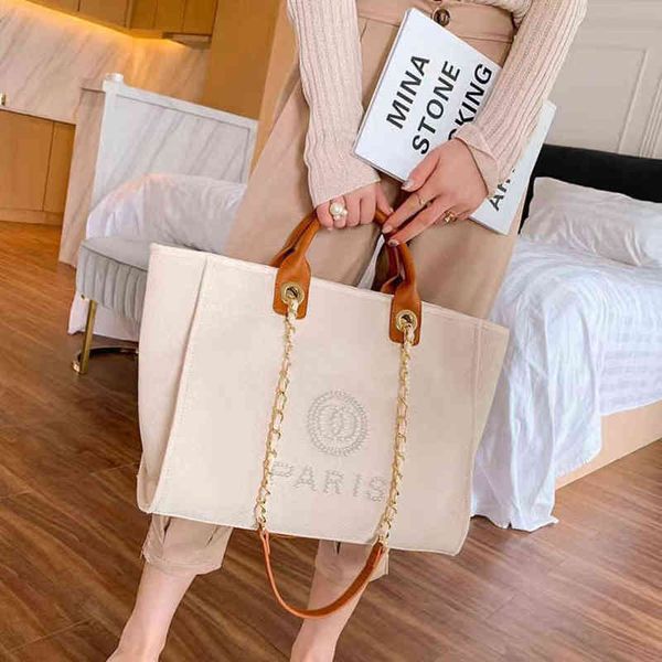 fashion classic label pearl beach bags luxury evening bag designers canvas portable large capacity female handbag brand ch women big handbag
fashion classic label pearl beach bags luxury evening bag designers canvas portable large capacity female handbag brand ch women big handbag