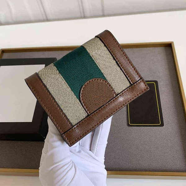 wallet women men designer wallets coin purse short clip womens classic fashion buckle zipper fold card holder purses, Red;black
wallet women men designer wallets coin purse short clip womens classic fashion buckle zipper fold card holder purses, Red;black