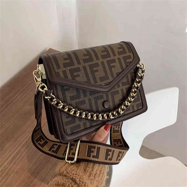 women new fashion versatile wide strap small square single messenger fashion design purses online
women new fashion versatile wide strap small square single messenger fashion design purses online
