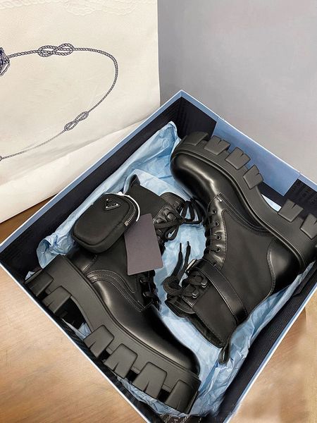 women designers oversized leather shoes boots ankle martin monolith black boot military inspired combat platform bottom nylon bouch with bag
women designers oversized leather shoes boots ankle martin monolith black boot military inspired combat platform bottom nylon bouch with bag