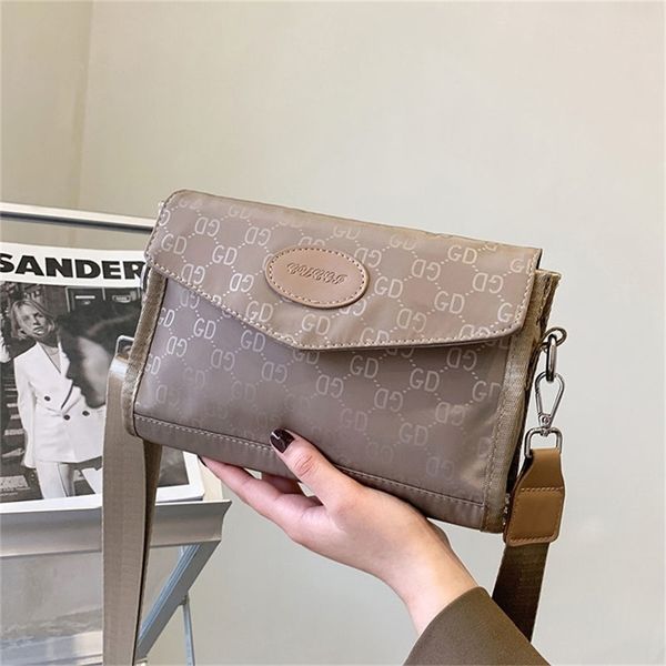 cloth women's new versatile popular small square ins red broadband single messenger wholesale design purses online
cloth women's new versatile popular small square ins red broadband single messenger wholesale design purses online