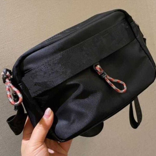 2023very elegant black nylon canvas bag brand messenger bags men women outdoor sports backpack fashion zipper pocket wallet
2023very elegant black nylon canvas bag brand messenger bags men women outdoor sports backpack fashion zipper pocket wallet