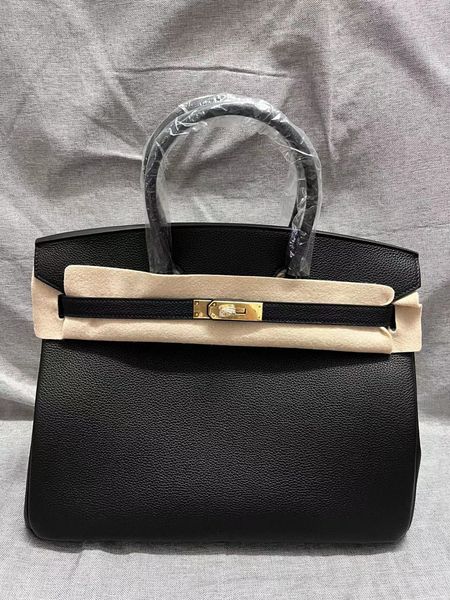 35cm tote togo leather brand handbag fully handmade 2 wax line stitching black etain etaupe blue 4colors to choose in stock fast delivery
35cm tote togo leather brand handbag fully handmade 2 wax line stitching black etain etaupe blue 4colors to choose in stock fast delivery