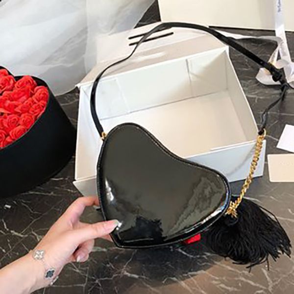 love bag soft calfskin heart-shaped messenger bag iconic with dramatic tassel pocket leather made in italy designer handbag
love bag soft calfskin heart-shaped messenger bag iconic with dramatic tassel pocket leather made in italy designer handbag