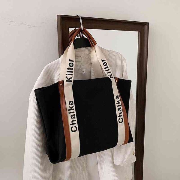 purse sale lazy wind large capacity women's canvas bag new messenger portable fashion with fresh college style shoulder bag
purse sale lazy wind large capacity women's canvas bag new messenger portable fashion with fresh college style shoulder bag