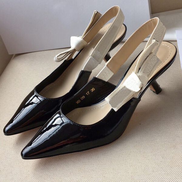 j a slingback pump black patent calfskin shoes is the epitome of the brand's craftsmanship two tone embroidered logo ribbon with flat b
j a slingback pump black patent calfskin shoes is the epitome of the brand's craftsmanship two tone embroidered logo ribbon with flat b