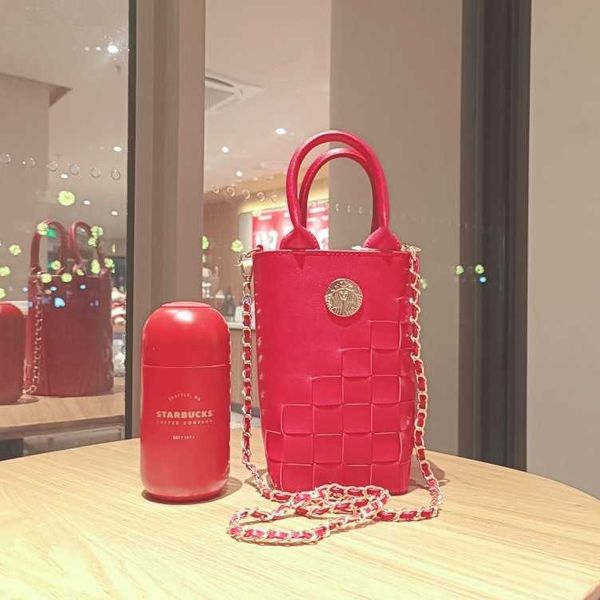 starbucks christmas cup vintage red stainless steel capsule shape thermos cup woven handbag accompanying water cup
starbucks christmas cup vintage red stainless steel capsule shape thermos cup woven handbag accompanying water cup