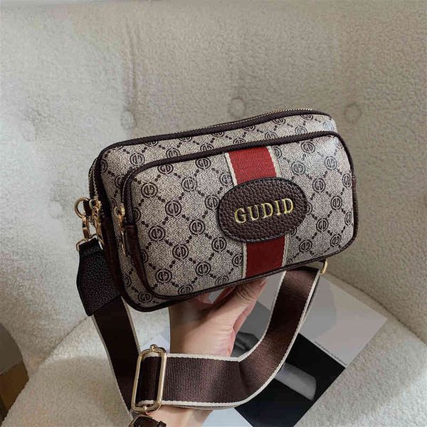 2022 luxury bags large capacity three-layer versatile messenger simple leisure bag women
2022 luxury bags large capacity three-layer versatile messenger simple leisure bag women