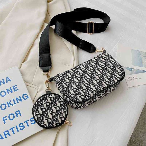 new canvas sling one shoulder messenger bag letter handbag two-piece set armpit bag women's bag
new canvas sling one shoulder messenger bag letter handbag two-piece set armpit bag women's bag